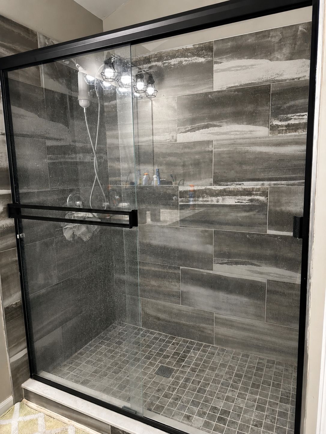 Shower glass detail before